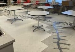 A series of tables and chairs in a room, showcasing the retail store's interior amidst reports of severe cracking issues